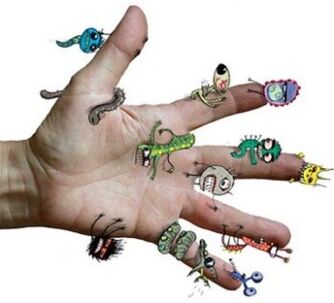 Germs and parasites on a human hand.